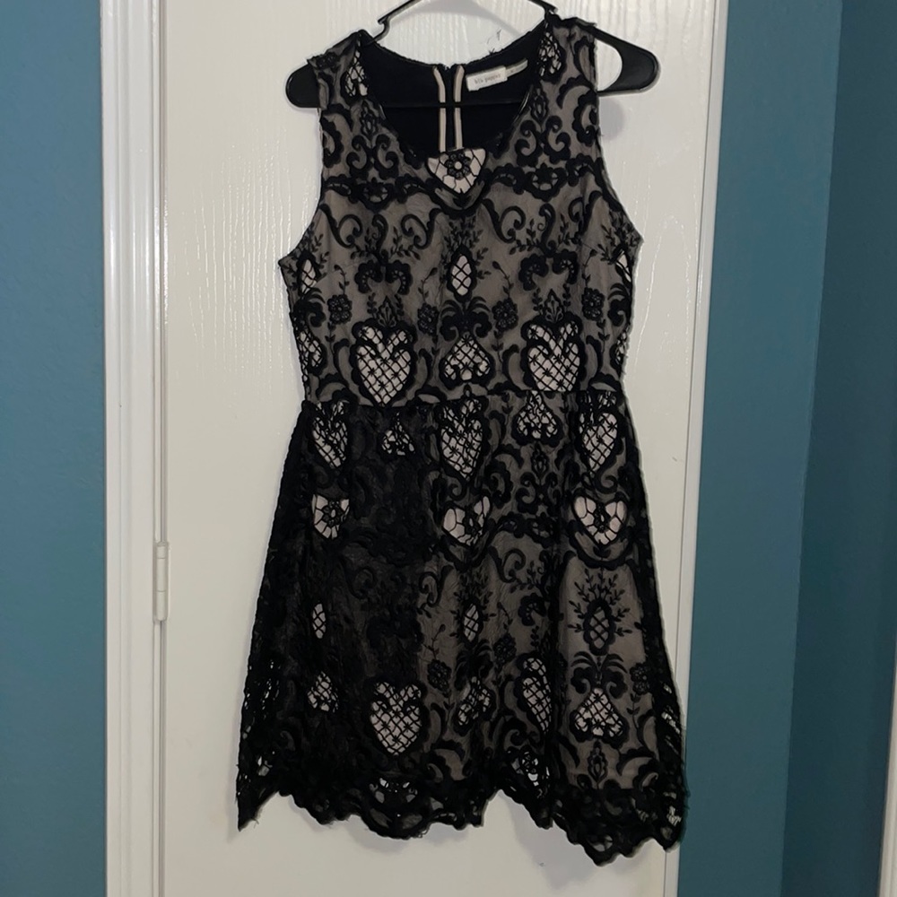 Black lace over tan dress. Beautiful material.